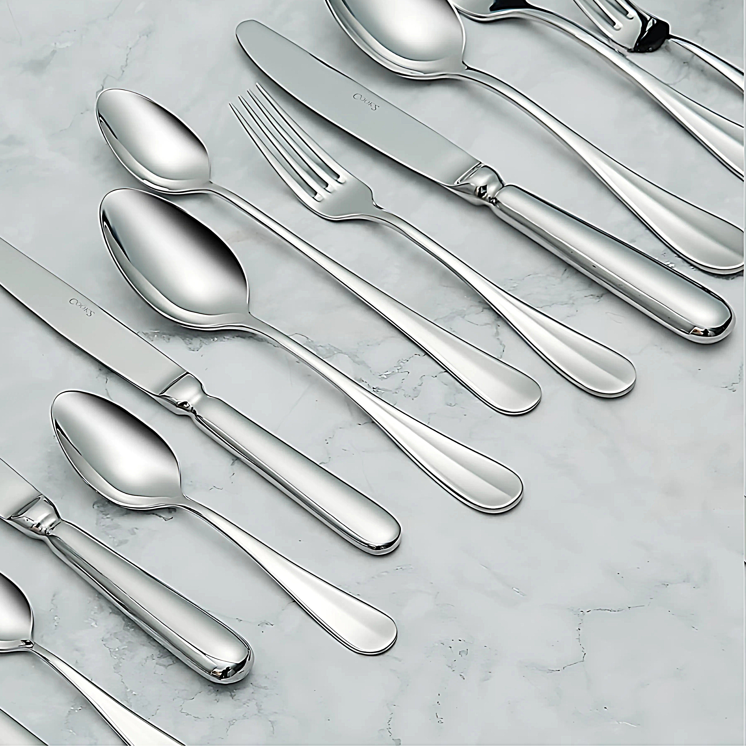 Full Baguette 2302 cutlery set arranged on dining table
Close-up of Baguette 2302 hollow handle table knife
Dessert fork, spoon, and knife – Baguette 2302 pattern
Butter knife and cake fork from Baguette 2302 flatware
Mocca spoon and American-size tea spoon in stainless steel
Soda spoon and table spoon – Baguette 2302 design
Elegant stainless steel table fork and spoon – Baguette 2302
Hollow handle dessert knife with polished finish – Baguette 2302