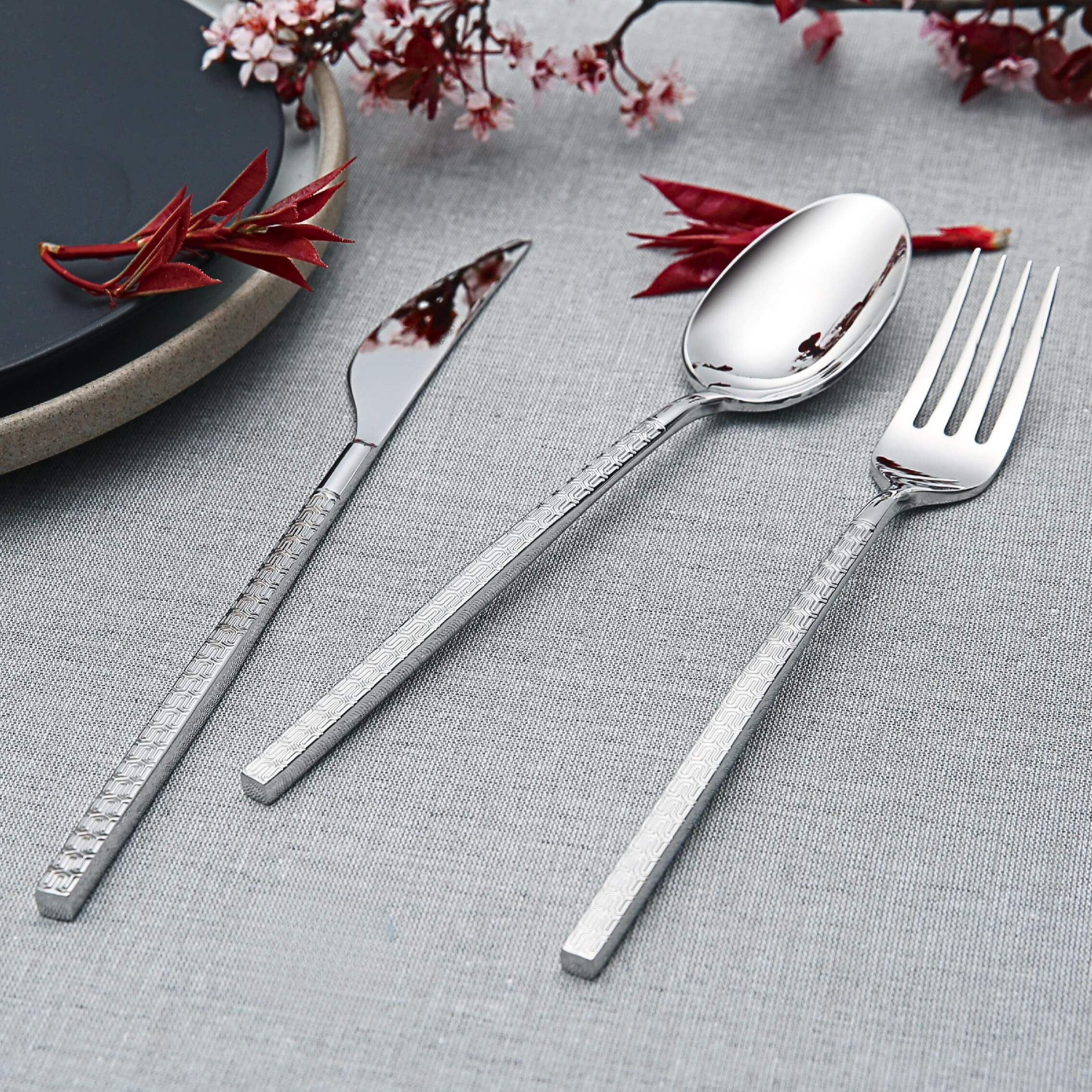 Eden stainless steel table knife, fork, spoon, and tea spoon set
Minimalist flatware set – Eden pattern in polished finish
Close-up of Eden cutlery on neutral background
Tea spoon and table spoon from Eden collection
Everyday dining flatware – Eden knife and fork
4-piece Eden stainless cutlery set in modern setting