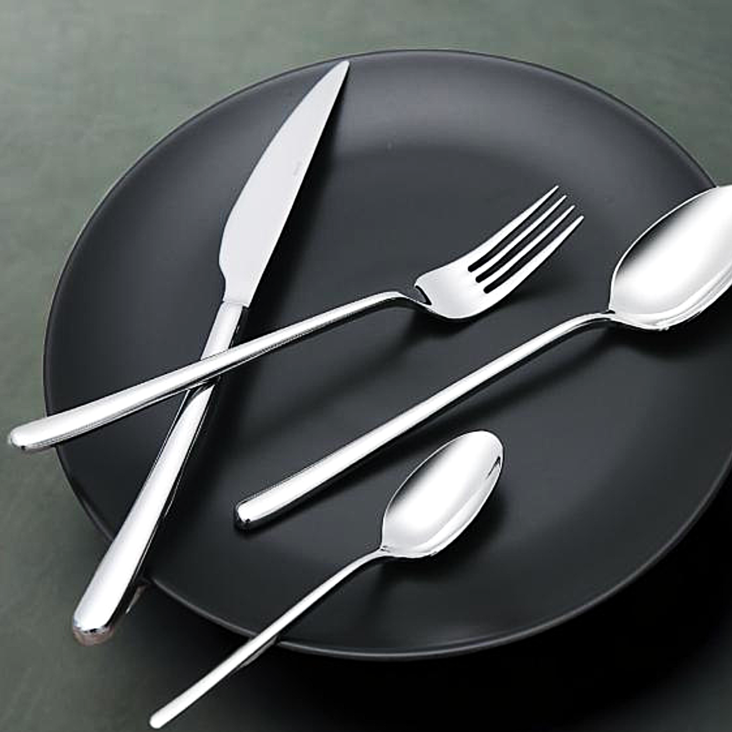 Hermes stainless steel cutlery set with chopsticks and soda spoon
Close-up of Hermes table knife, fork, and spoon
Cake server and butter knife – Hermes polished finish
Tea spoon and mocca spoon from Hermes flatware collection
Dessert knife, cake fork, and dessert spoon – Hermes pattern
Fruit fork and chopstick set – Hermes modern design
Hermes cutlery set displayed on neutral tablecloth
Elegant full place setting featuring Hermes utensils