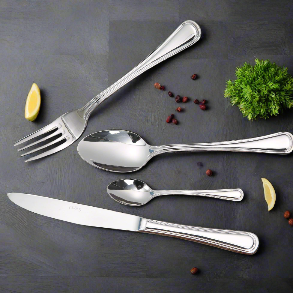 Meran cutlery set with polished stainless steel finish
Table knife and table fork – Meran collection close-up
Dessert spoon and dessert fork – Meran flatware
Tea spoon and mocca spoon – Meran stainless steel
Meran table setting with full cutlery set
Elegant stainless steel utensils – Meran pattern
Polished Meran flatware set on napkin or plate
Complete Meran stainless cutlery collection displayed