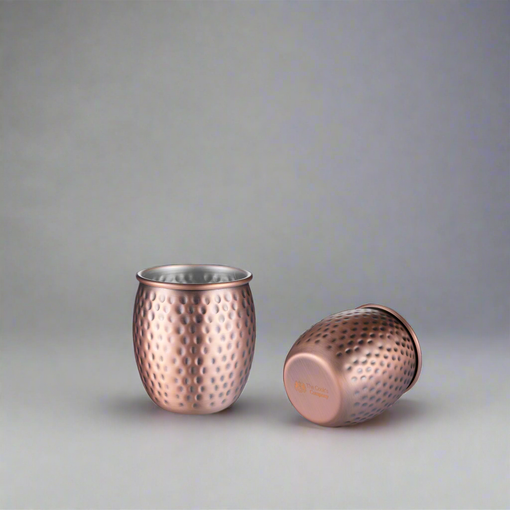The Cooks Company Moscow Mule Mug 400 ml – Copper-Plated Stainless Steel Cocktail Mug
Side view of The Cooks Company 400 ml Moscow Mule Mug with copper finish
Top-down view of The Cooks Company Moscow Mule Mug showing stainless steel interior
The Cooks Company Copper Mule Mug with welded handle – 400 ml capacity
Elegant copper mug for Moscow Mules by The Cooks Company
The Cooks Company branded stainless steel mug with polished copper exterior
Hand holding The Cooks Company 400ml copper Moscow Mule mug