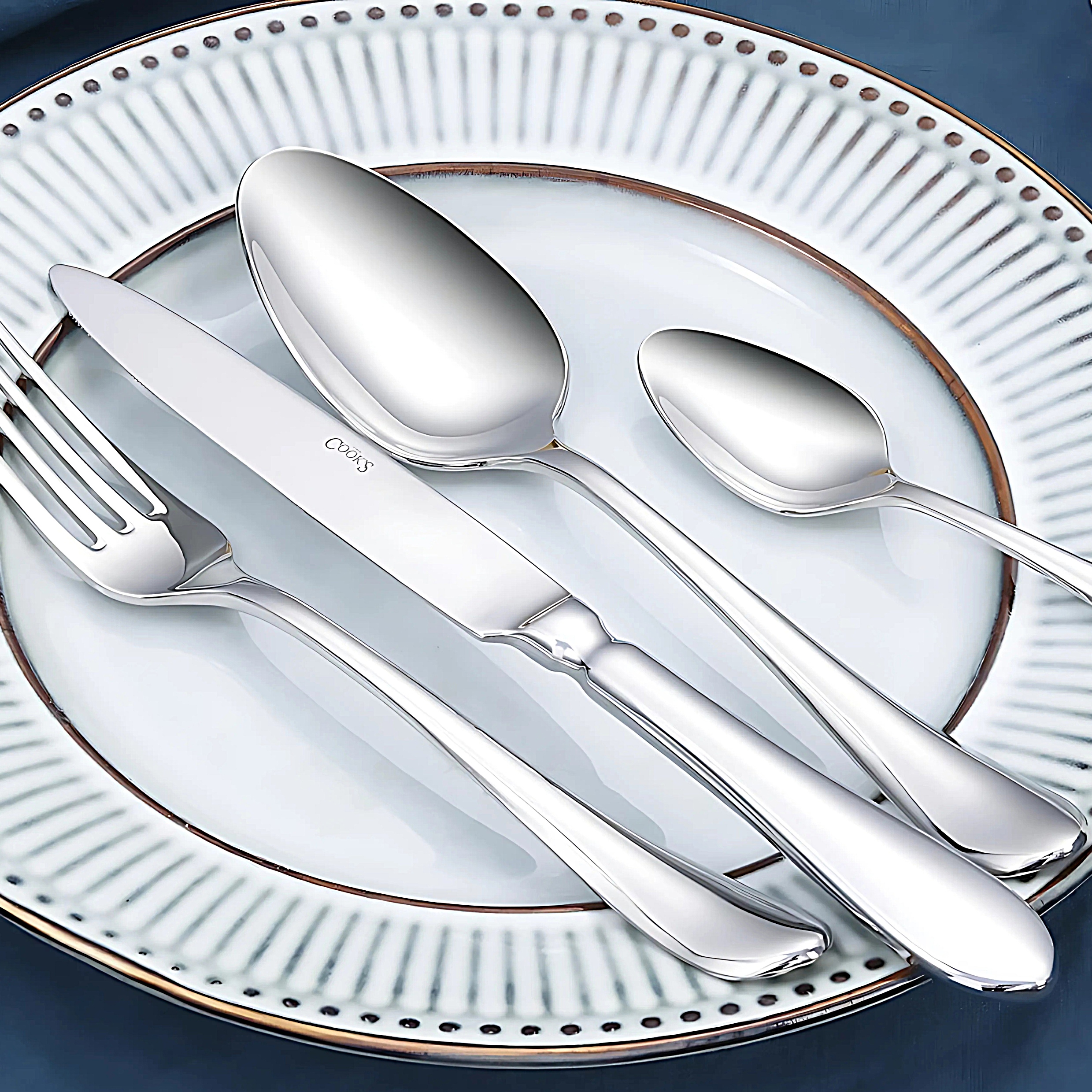 Nordic stainless steel cutlery set on minimalist background
Close-up of Nordic table knife and fork with clean lines
Nordic steak knife and dessert spoon polished finish
Tea spoon and mocca spoon from Nordic pattern collection
Butter knife and soda spoon – Nordic modern flatware
Serving spoon and fork – Nordic stainless steel collection
Nordic cake fork and dessert knife on neutral tablecloth
Nordic soup spoon and table spoon in elegant flat lay