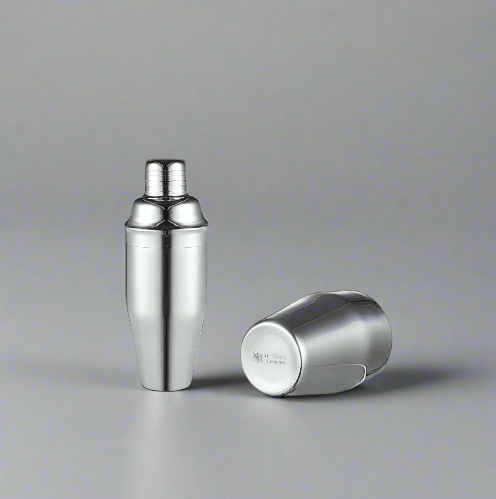 The Cooks Company 700 ml Stainless Steel Cocktail Shaker blends flavors smoothly and chills drinks fast. Ideal for mojitos, margaritas, and more.Stainless Steel Cocktail Shaker – 700 ml
700 ml cocktail shaker with sleek finish by The Cooks Company
Mixing mojito with stainless steel shaker – The Cooks Company
Side view of 700 ml bartender cocktail shaker
Shaker on bar top filled with ice – The Cooks Company
Polished stainless steel drink shaker for home and bar use
The Cooks Company cocktail shaker set