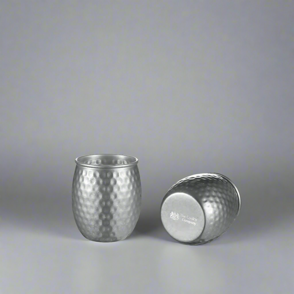 The Cooks Company Moscow Mule Mug 550 ml in silver stainless steel
Side view of The Cooks Company 550 ml silver cocktail mug with handle
Top view of silver stainless steel Moscow Mule mug by The Cooks Company
Large 550 ml silver Moscow Mule mug with smooth finish
Modern stainless steel mug for cocktails – The Cooks Company
The Cooks Company silver mule mug for mojitos and iced drinks
Ergonomic handle on The Cooks Company silver 550 ml cocktail mug
The Cooks Company silver Moscow Mule mug on bar count