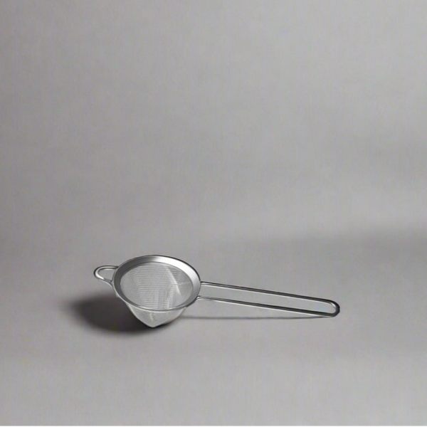 The Cooks Company Stainless Steel Bar Strainer 25.7 cm

Close-up of fine mesh bar strainer by The Cooks Company

Cocktail being strained using The Cooks Company bar tool

Top view of The Cooks Company conical strainer

Rust-resistant stainless steel cocktail strainer – 25.7 cm

Side profile of The Cooks Company bar strainer with long handle

Professional bar tool for straining pulp and seeds